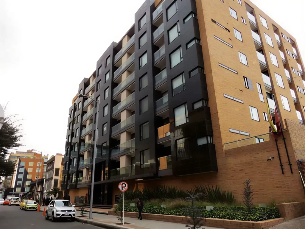 Exterior of executive apartments near Parque de la 93 in Bogotá with modern brick facade.
