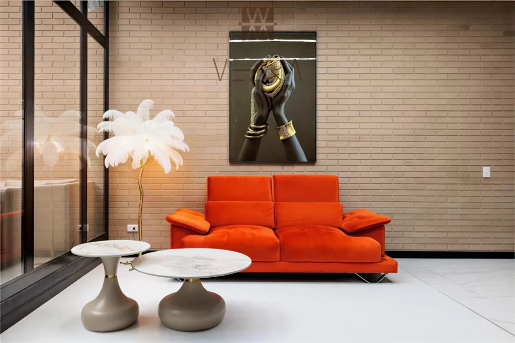 Luxury residence living room with orange velvet sofa and wall art in Bogotá