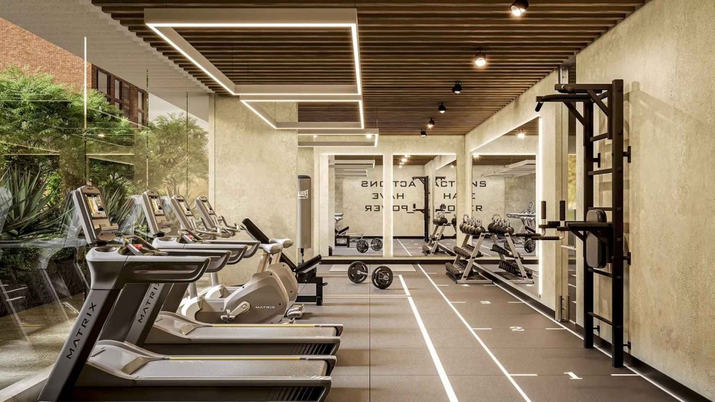 Gimnasio moderno de lujo en el norte de Bogotá con equipos de alta gama y diseño contemporáneo, experiencia fitness premium