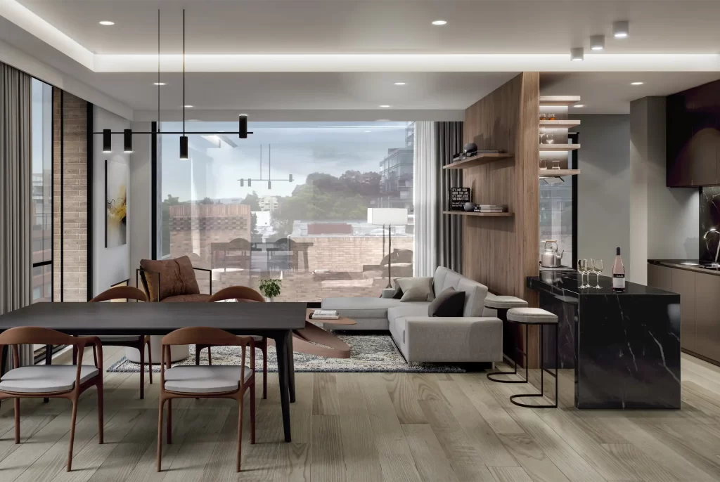 Sala y comedor de apartamento VEZRA para ejecutivos en Bogotá con isla de mármol y vista al barrio, alternativa al hotel de lujo.