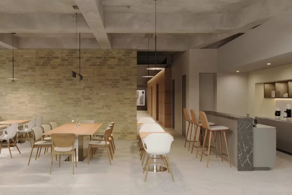 Área común con comedor y barra de café en apartamento VEZRA Bogotá Parque 93, diferencial frente a hotel de lujo