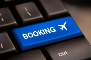 Tecla de teclado con texto Booking que representa reserva directa sin intermediarios.